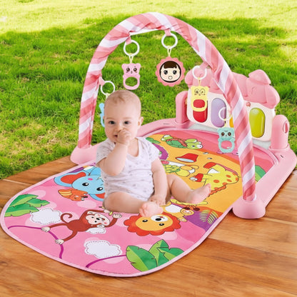 tapis éveil rose bébé assis jardin